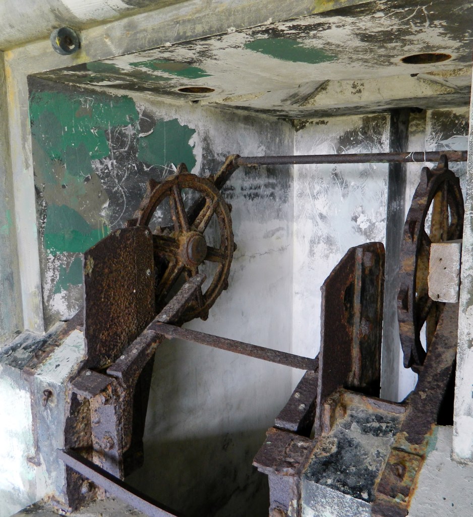 There are a lot of old, rusty mechanisms still in the buildings. Trying to guess what they were used for is half the fun of walking around. Maybe pulling up supplies from down below?