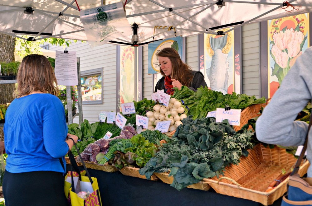 Taking time to speak to the farmers is all part of the shopping experience.