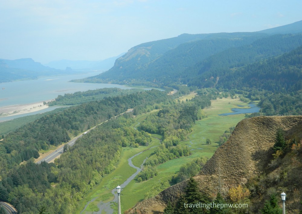 The views from the Vista House are too good to be true. Here a lush valley and the mighty Columbia River can be seen looking upstream.