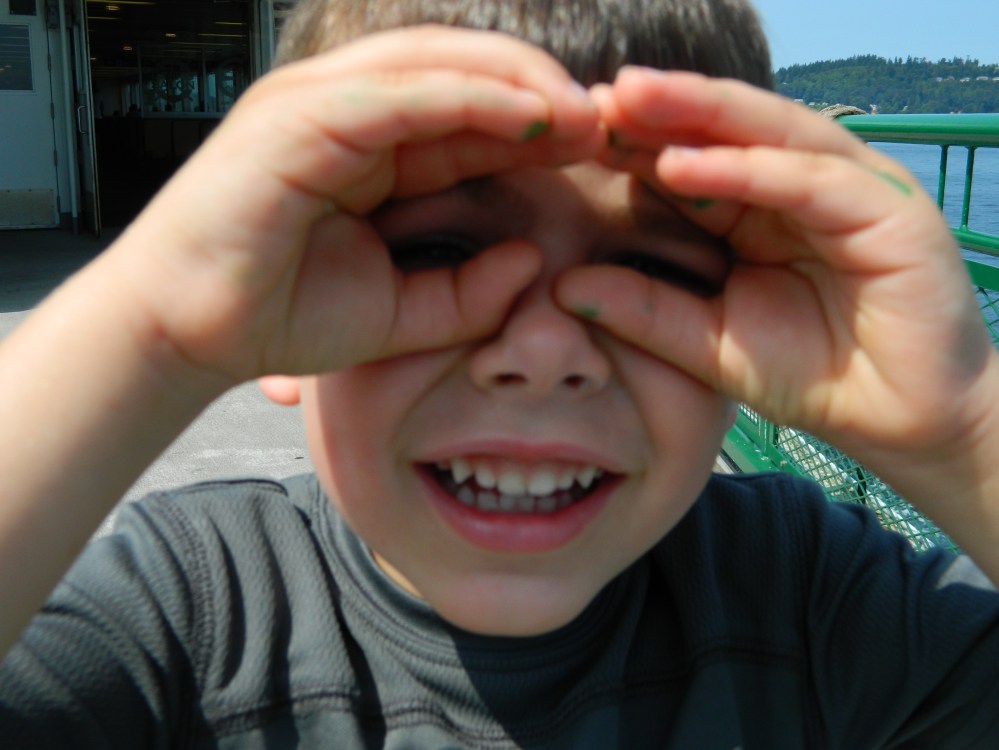 Our nephew Emmett hamming it up on the ferry ride to the Olympic Peninsula.