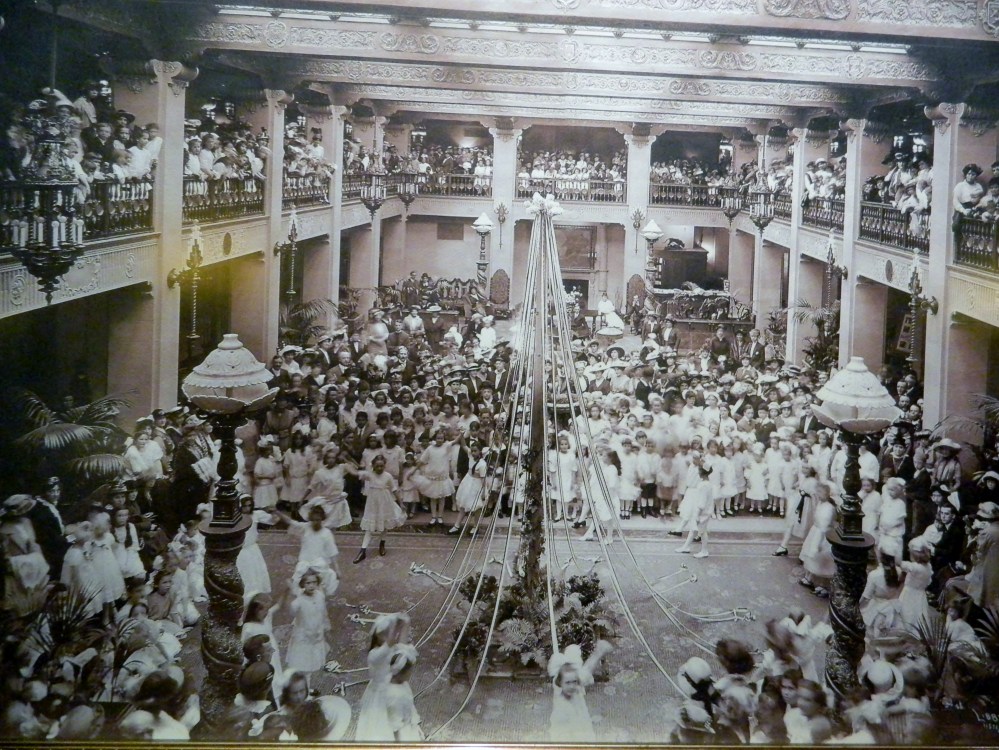 The walls of the balcony overlooking the lobby of the Davenport Hotel are lined with old photos like this one.