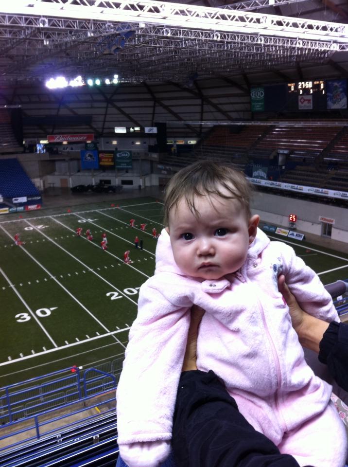 Even journalists' children are subject to events. Catarina at her first football game, the Class 1B eight-man state championship in 2013 at the Tacoma Dome.