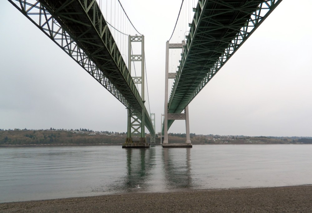 Hidden Beach in Gig Harbor allows you to stand directly underneath the mighty Narrows Bridge.