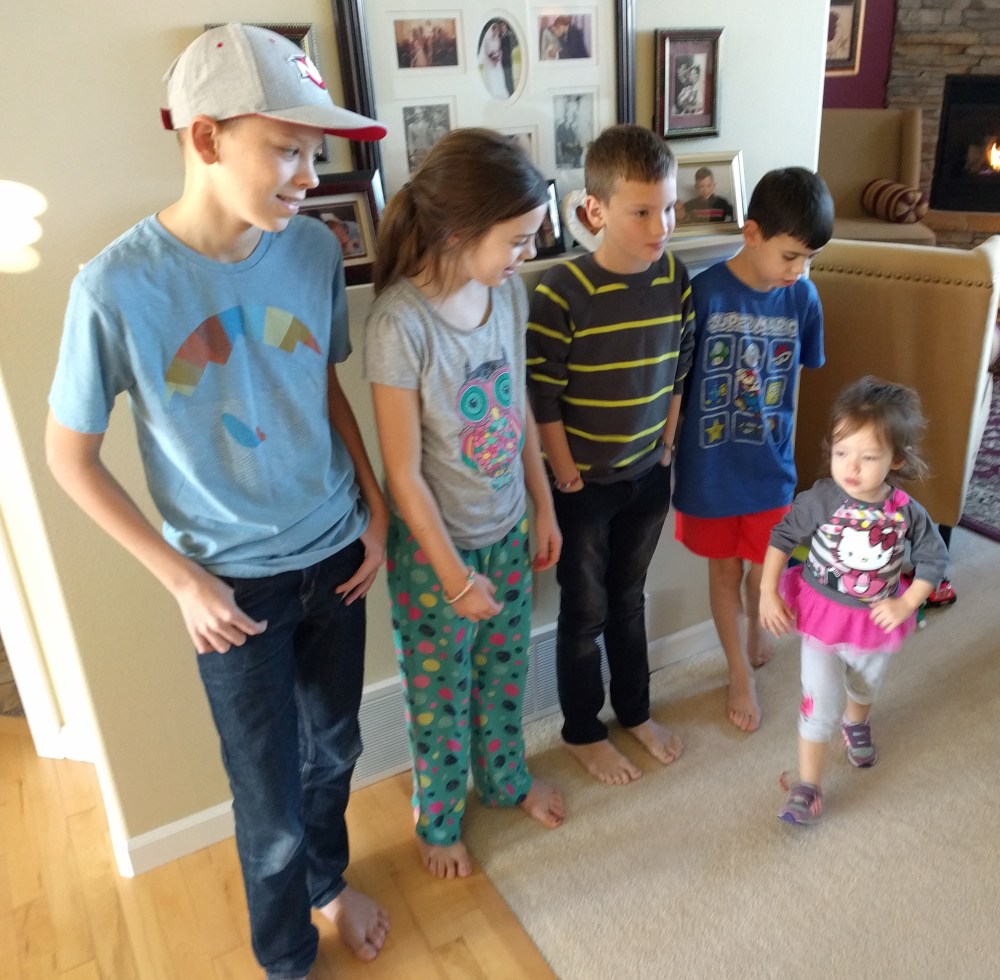 Catarina was not interested in standing with her cousins to take a photo. She had her shoes on and she was out of there, thank you very much.