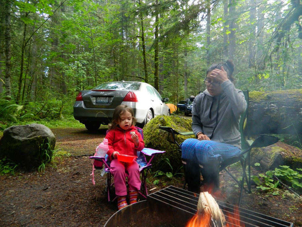 Catarina and Veronica warming up next to the fire at Big Creek Campground.