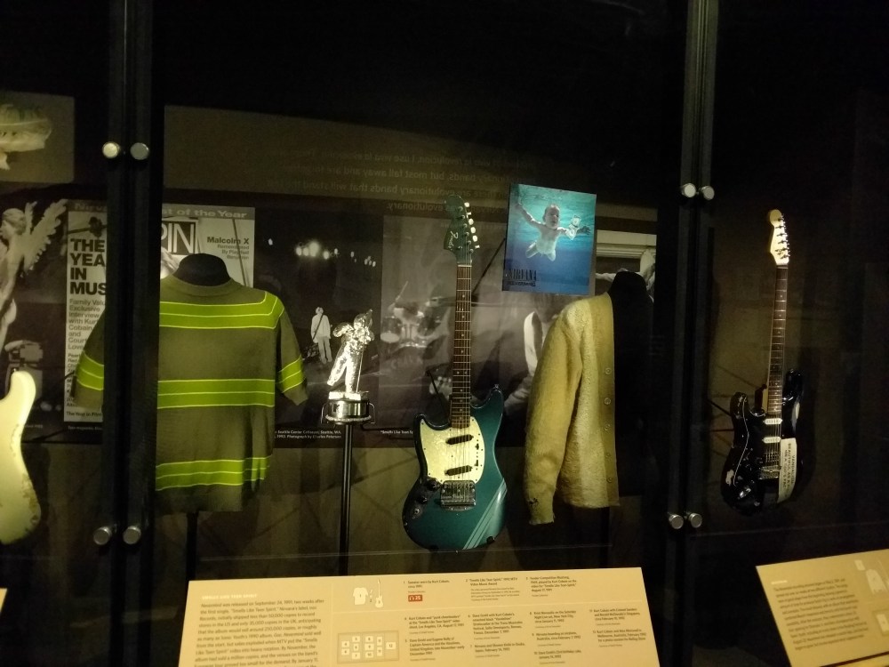 Some of the Nirvana exhibit. The classic sweaters that Kurt Cobain wore are on display.