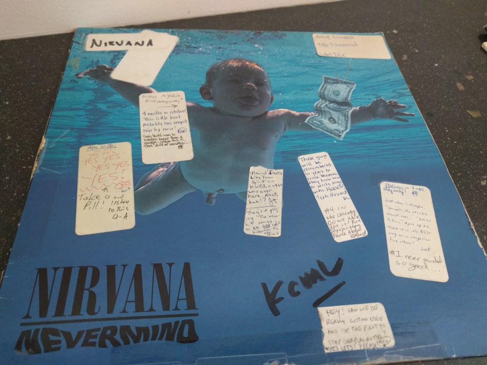 Nirvana's Nevermind album with KEXP DJ notes stuck to it.
